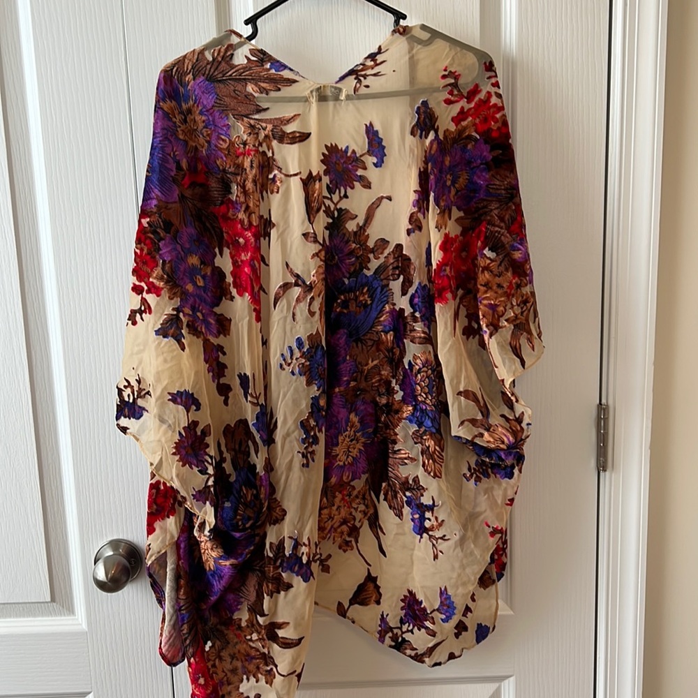 Nude and floral open front shrug